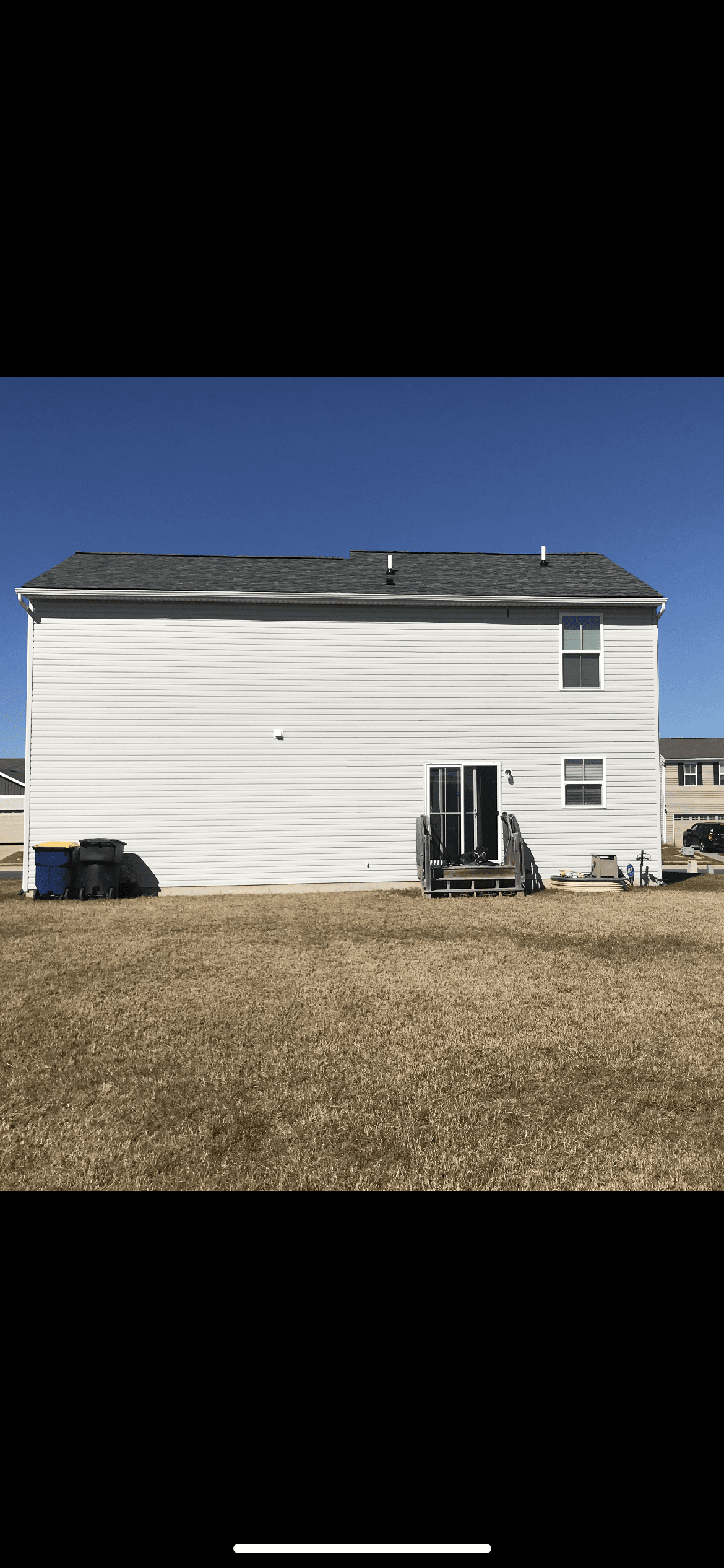 Home exterior after full siding replacement